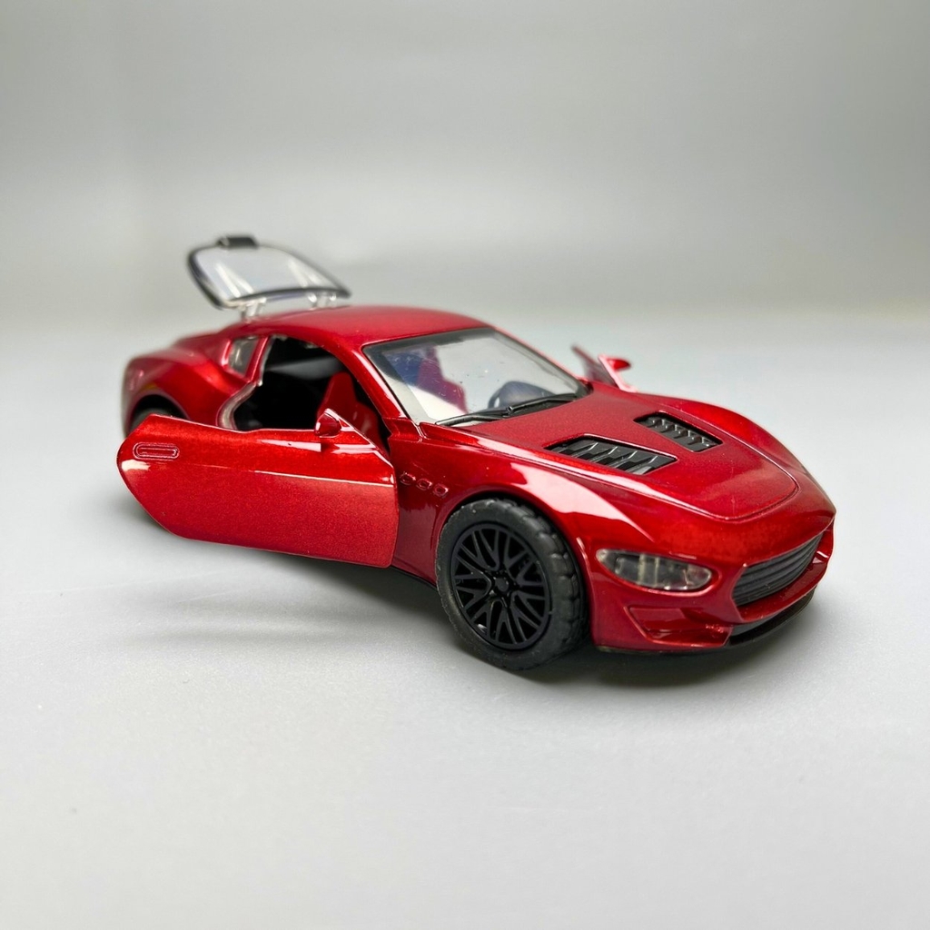 Mô Hình xe Maserati 3200 GT màu đỏ - tỉ lệ 1:36 Hợp kim có thể mở cửa - bánh sau chạy cót - Dài 12cm - rộng 5cm - cao 3.5cm - nặng : 200gram - FULL BOX : box màu