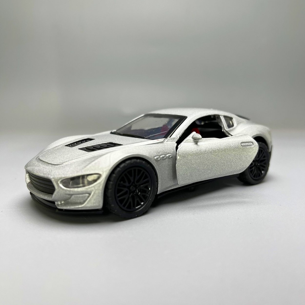 Mô Hình xe Maserati 3200 GT màu xám - tỉ lệ 1:36 Hợp kim có thể mở cửa - bánh sau chạy cót - Dài 12cm - rộng 5cm - cao 3.5cm - nặng : 200gram - FULL BOX : box màu