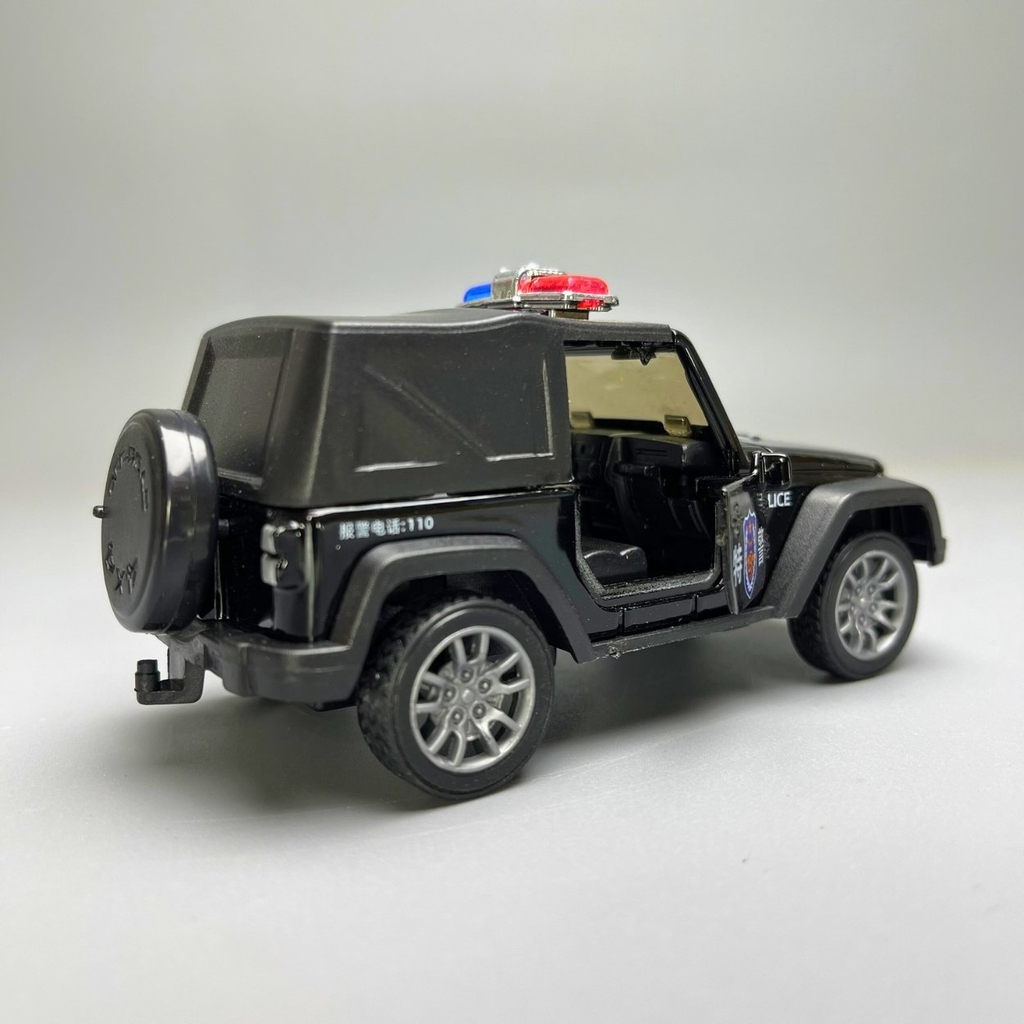 Mô Hình xe JEEP Police màu đen - tỉ lệ 1:36 Hợp kim có thể mở cửa - bánh sau chạy cót - Dài 11cm - rộng 5cm - cao 4cm - nặng : 200gram - FULL BOX : box màu