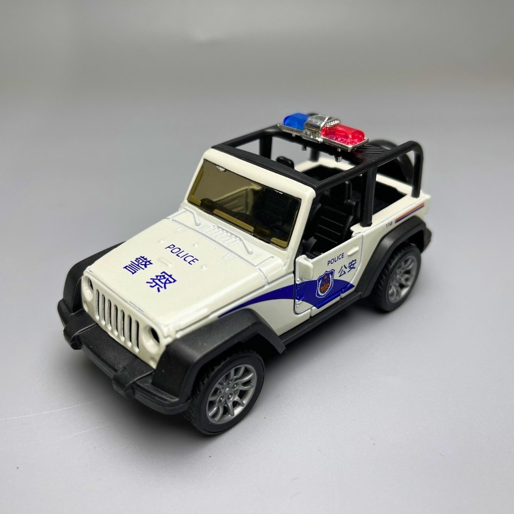 Mô Hình xe JEEP Police màu trắng - tỉ lệ 1:36 Hợp kim có thể mở cửa - bánh sau chạy cót - Dài 11cm - rộng 5cm - cao 4cm - nặng : 200gram - FULL BOX : box màu