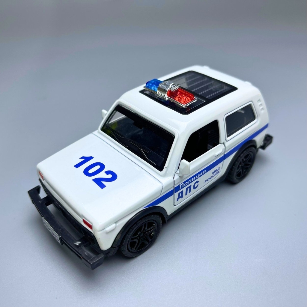 Mô Hình xe oto Police 102 màu trắng  - tỉ lệ 1:36 Hợp kim có thể mở cửa - bánh sau chạy cót - Có tiếng - đèn pha sáng - Dài 12cm - rộng 5cm - cao 4cm - nặng : 200gram - FULL BOX : box màu