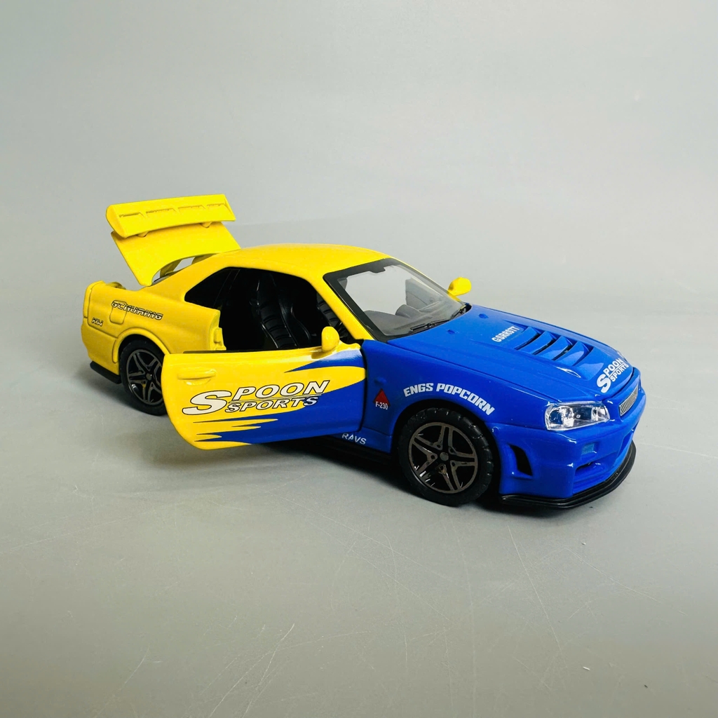 Mô Hình xe nissan xanh vàng tỉ lệ 1:32 Hợp kim có thể mở cửa - bánh sau chạy cót - Dài 15cm - rộng 7cm - cao 5cm - nặng : 500gram - FULL BOX : box màu SKU : oto331 n3-k2-t4-s3