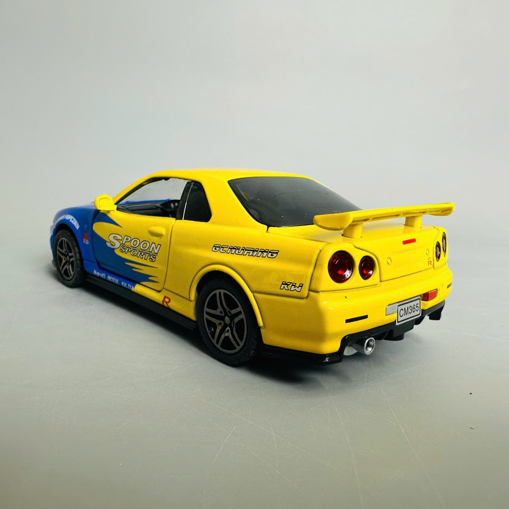 Mô Hình xe nissan xanh vàng tỉ lệ 1:32 Hợp kim có thể mở cửa - bánh sau chạy cót - Dài 15cm - rộng 7cm - cao 5cm - nặng : 500gram - FULL BOX : box màu SKU : oto331 n3-k2-t4-s3
