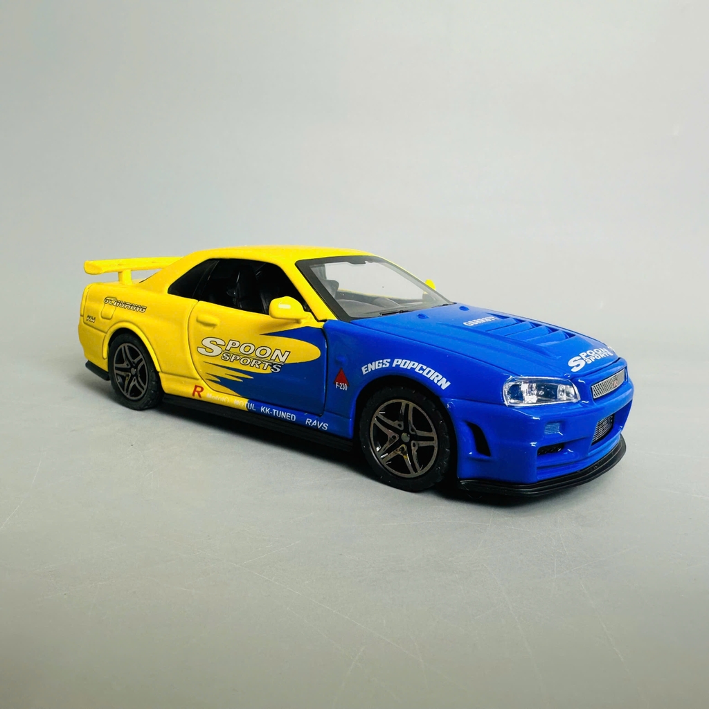 Mô Hình xe nissan xanh vàng tỉ lệ 1:32 Hợp kim có thể mở cửa - bánh sau chạy cót - Dài 15cm - rộng 7cm - cao 5cm - nặng : 500gram - FULL BOX : box màu SKU : oto331 n3-k2-t4-s3