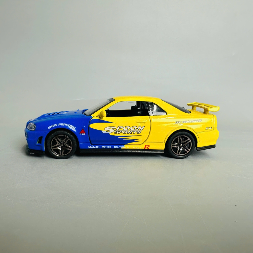 Mô Hình xe nissan xanh vàng tỉ lệ 1:32 Hợp kim có thể mở cửa - bánh sau chạy cót - Dài 15cm - rộng 7cm - cao 5cm - nặng : 500gram - FULL BOX : box màu SKU : oto331 n3-k2-t4-s3