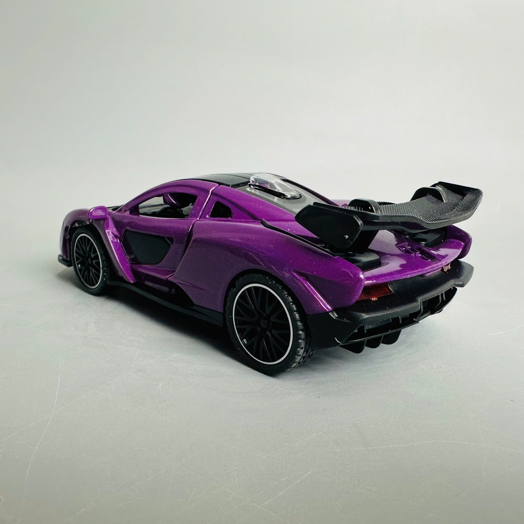 Mô Hình xe mclaren tím tỉ lệ 1:32 Hợp kim có thể mở cửa - bánh sau chạy cót - Dài 14cm - rộng 6cm - cao 5cm - nặng : 500gram - FULL BOX : box màu SKU : oto370 n3-k2-t3-s1
