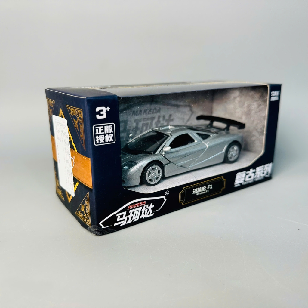 Mô Hình xe mclaren f1 xám tỉ lệ 1:32 Hợp kim có thể mở cửa - bánh sau chạy cót - Dài 12cm - rộng 5cm - cao 3cm - nặng : 300gram - FULL BOX : box màu SKU : oto445 - K70-T4-S2