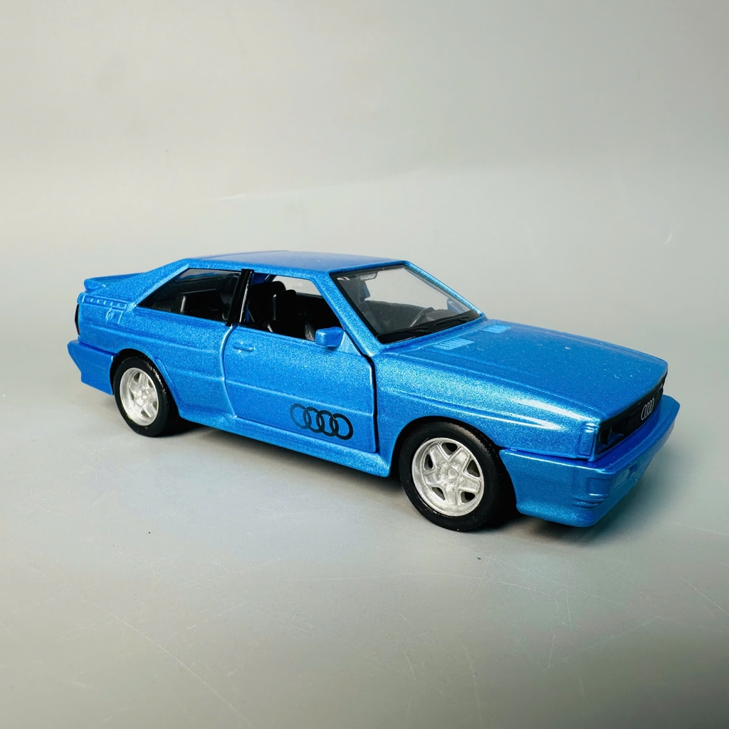 Mô Hình xe Audi Quattro 1980 xanh tỉ lệ 1:32 Hợp kim có thể mở cửa - bánh sau chạy cót - Dài 12cm - rộng 4.5cm - cao 3.5cm - nặng : 300gram - FULL BOX : box màu SKU : oto449 - K70-T4-S6
