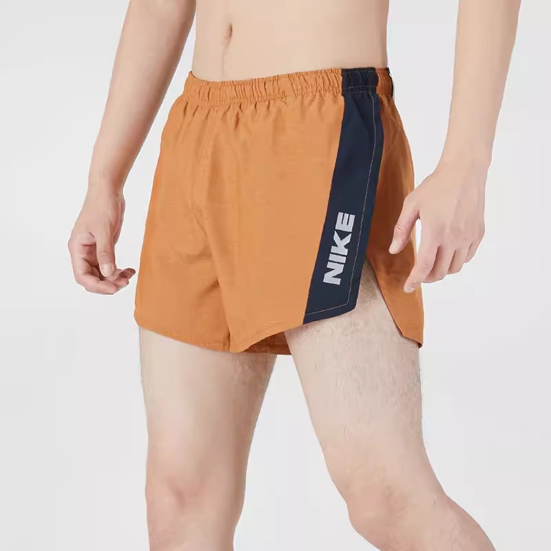 Quần Nike cam