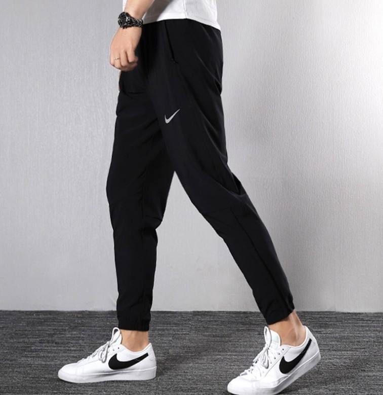 Quần gió Nike đen BV4834-010