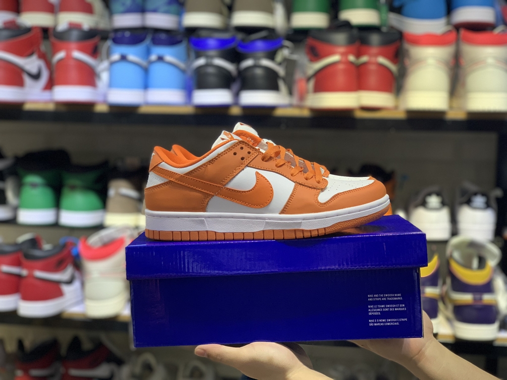 orange and white dunks low gs