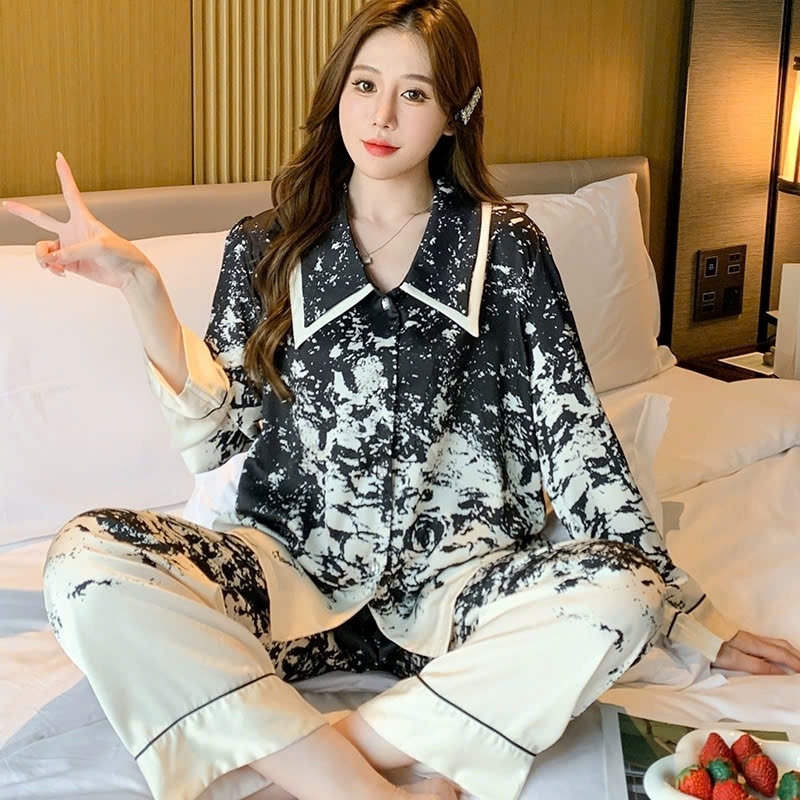 Bộ đồ ngủ nữ áo len cardigan dài tay bằng lụa băng, in họa tiết mực đen thanh lịch DN146250