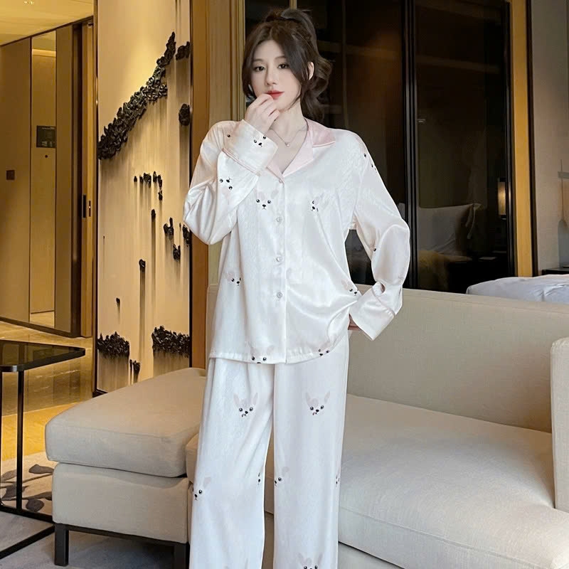 Bộ đồ ngủ lụa băng dài tay màu trắng với họa tiết thỏ con dễ thương, phong cách nhẹ nhàng DN147250