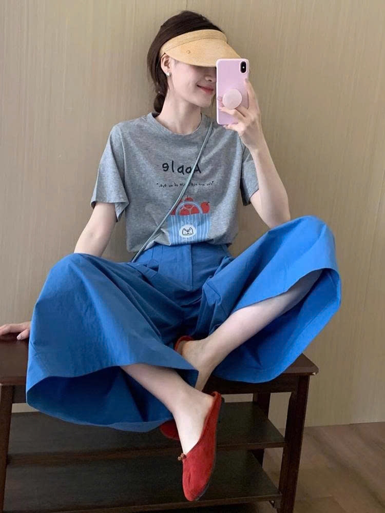Set Đồ Mùa Hè 2025 – Áo Phông Tay Ngắn Phong Cách Lười Biếng + Quần Váy Ống Rộng Thời Trang D168250