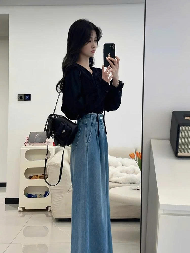 Set đồ sơ mi đen + quần jeans nữ 2025 D174250