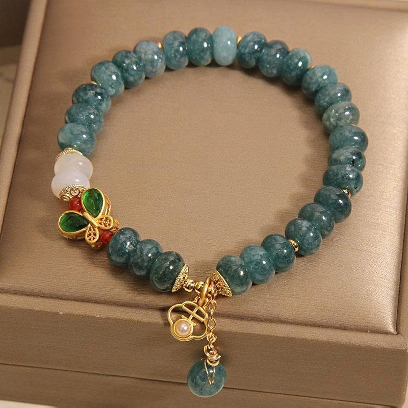 Vòng tay pha lê hạt ngọc bích xanh – Charm bướm sang trọng TS142250
