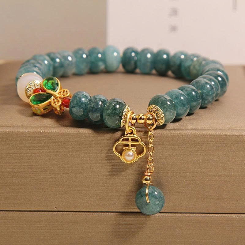 Vòng tay pha lê hạt ngọc bích xanh – Charm bướm sang trọng TS142250