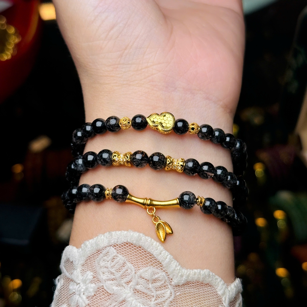 Thạch anh tóc đen 5.6li mix charm bạc mạ