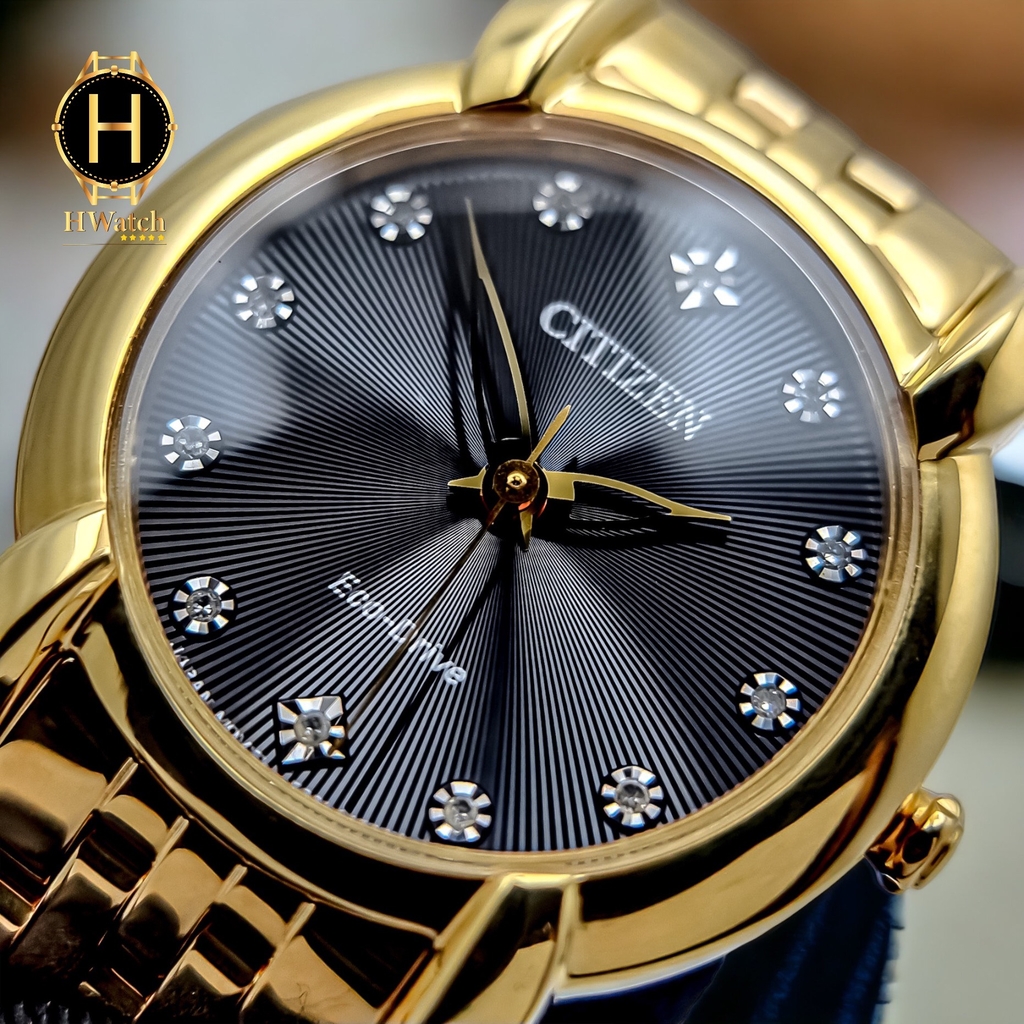 Đồng Hồ Nữ Citizen Quartz Eco-Drive EM0712-59E Dây Sắt Vàng Mặt Đen Sapphire
