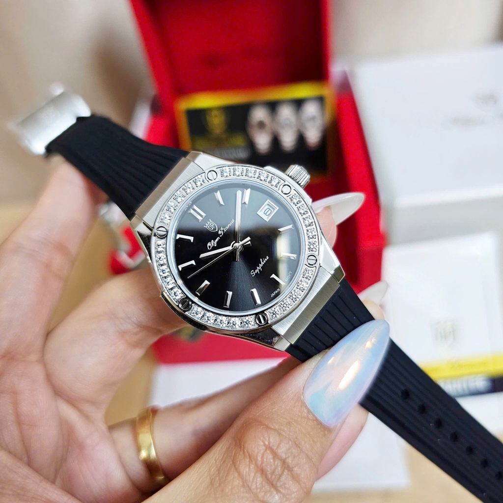 Đồng Hồ Nữ Olym Pianus Quartz OP990-45DLS-GL-D Dây Cao Su Mặt Đen Sapphire