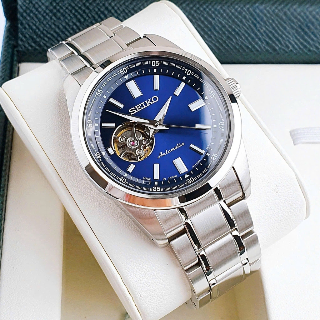 Đồng Hồ Nam Seiko Automatic Open Heart SCVE051 Dây Thép Vỏ Trắng Mặt Xanh