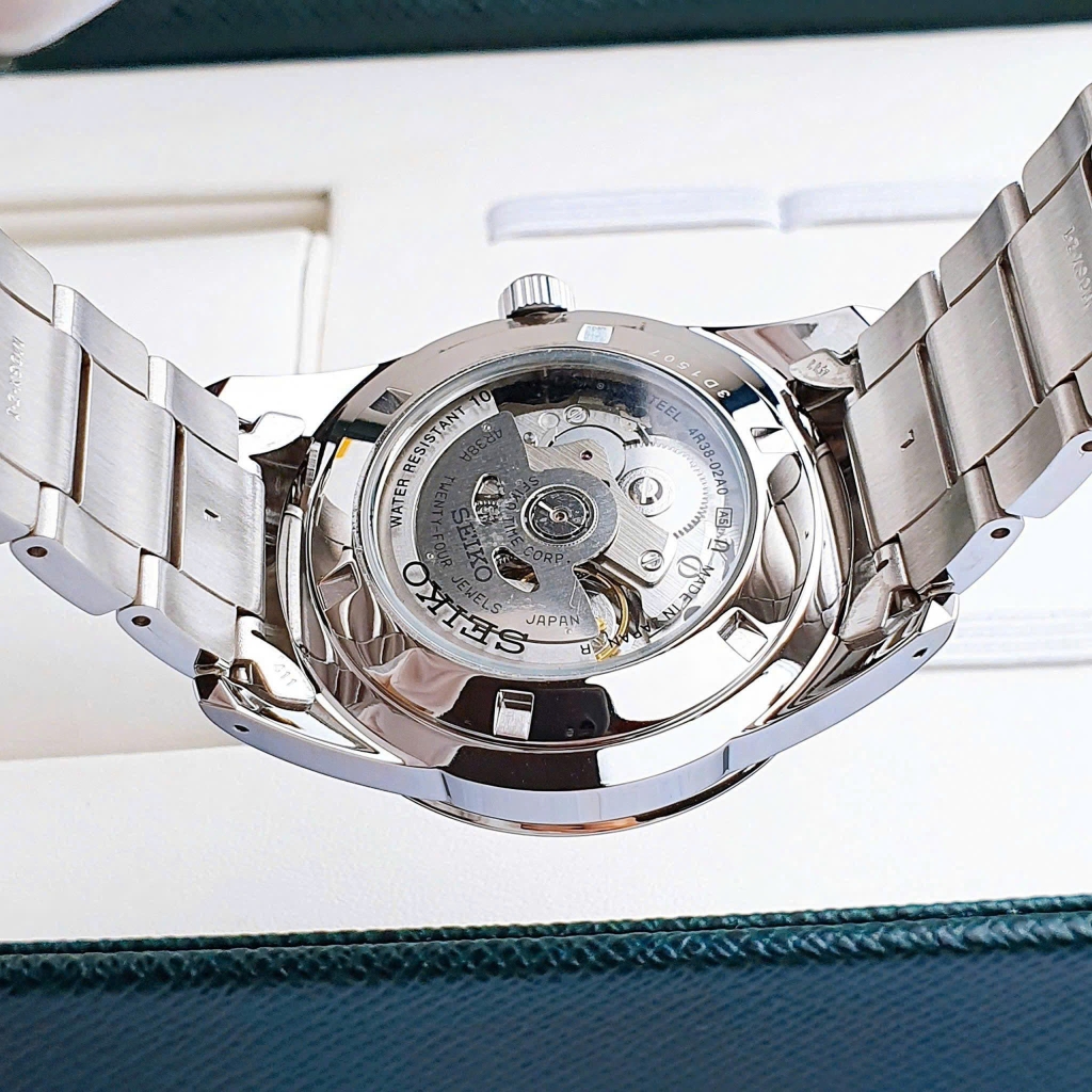 Đồng Hồ Nam Seiko Automatic Open Heart SCVE051 Dây Thép Vỏ Trắng Mặt Xanh