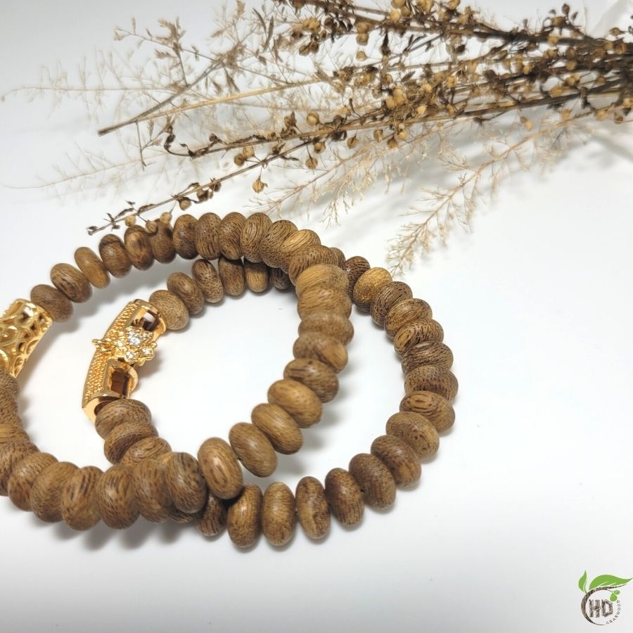 VÒNG TAY TRẦM HƯƠNG HẠT NÚT MIX HOA SEN VÀNG
