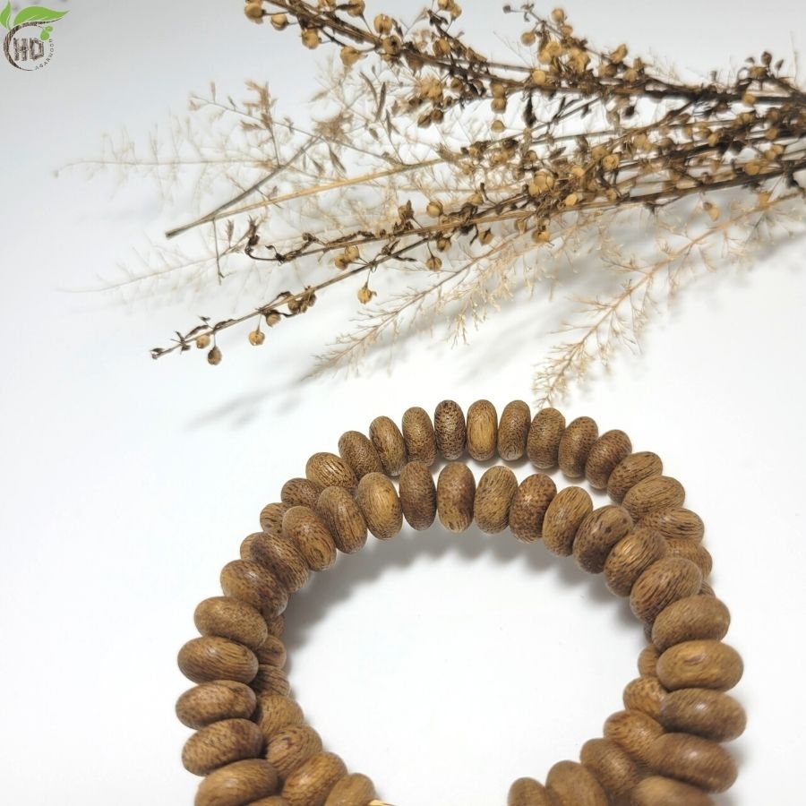 VÒNG TAY TRẦM HƯƠNG HẠT NÚT MIX HOA SEN VÀNG