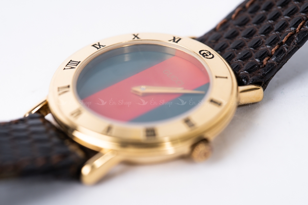 Đồng hồ Gucci mặt sọc xanh đỏ viền vàng
