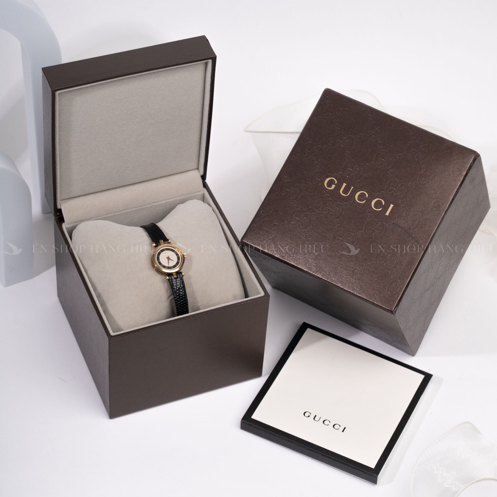 Đồng hồ Gucci mặt viền vàng tròn dây da logo GG