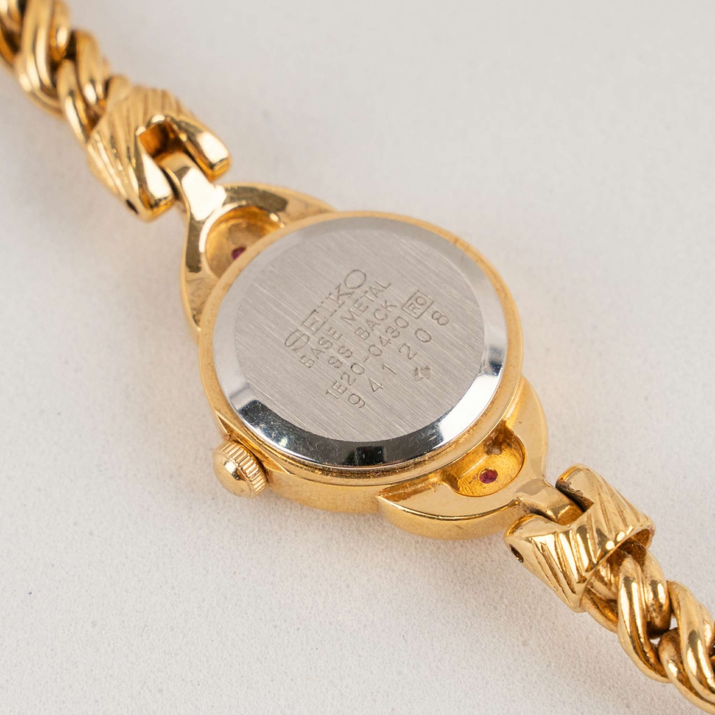Đồng hồ Seiko  thép không rỉ mạ vàng  dây thép xoắn, mặt vàng đính kim cương hồng 15200430941208