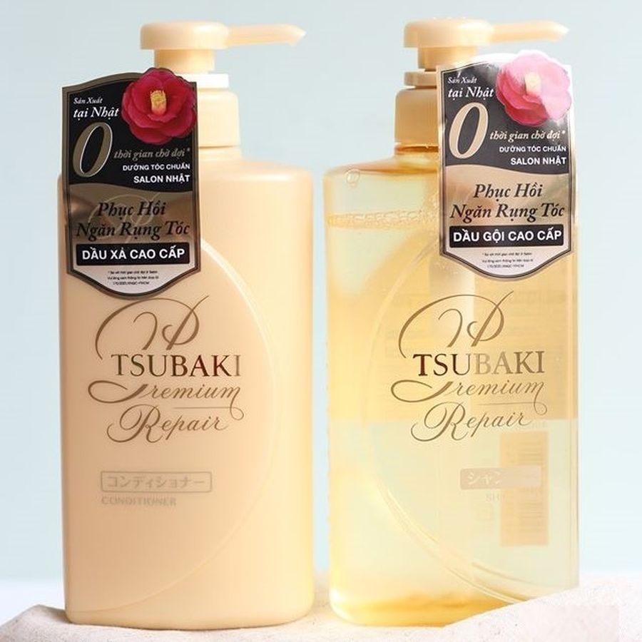 Cặp gội - xả Tsubaki Premium ngăn ngừa rụng tóc 490ml (màu vàng)