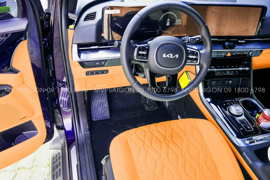 Bọc da ghế  đổi màu nội thất KIA Carnival màu cam Hermes
