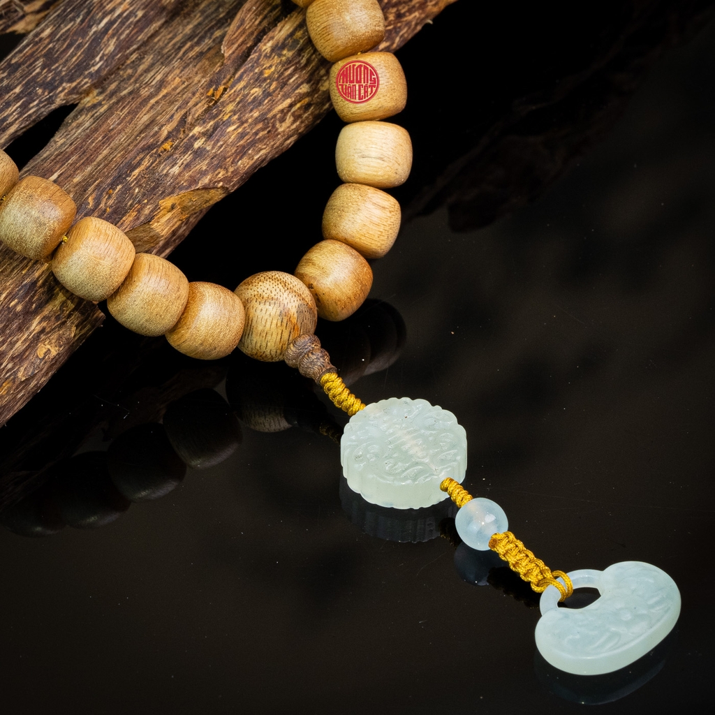 Chuỗi trầm hương Niệm Phật 36 hạt 12 li banh mix đá trắng