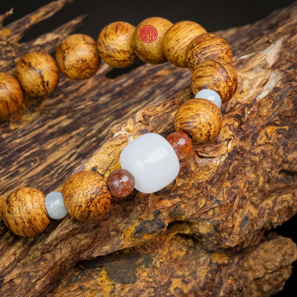 Vòng trầm hương tròn banh quầng 10 li mix ngọc trắng