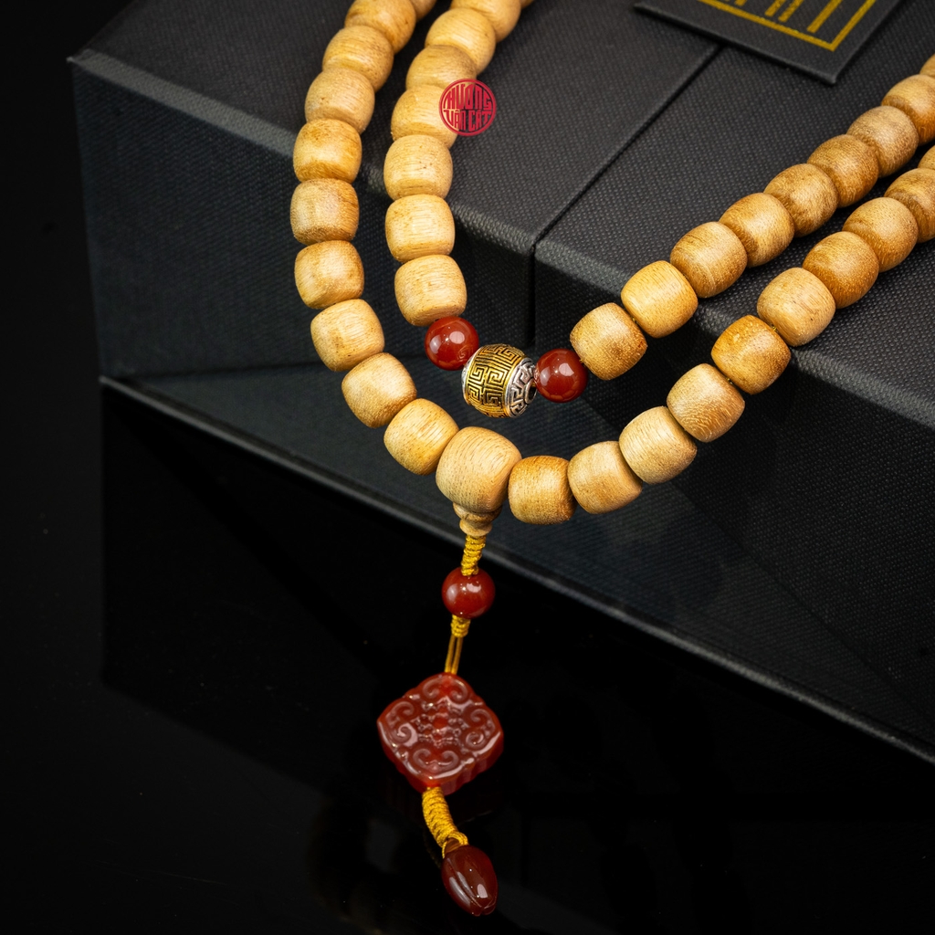 Chuỗi trầm hương Niệm Phật 108 hạt 10 li banh mix đá đỏ