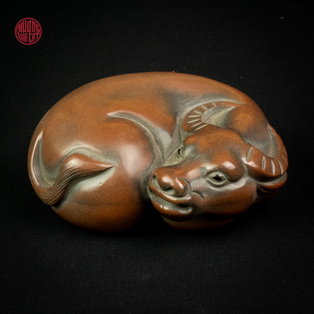 Tượng tử sa nê hưng trâu cuộn