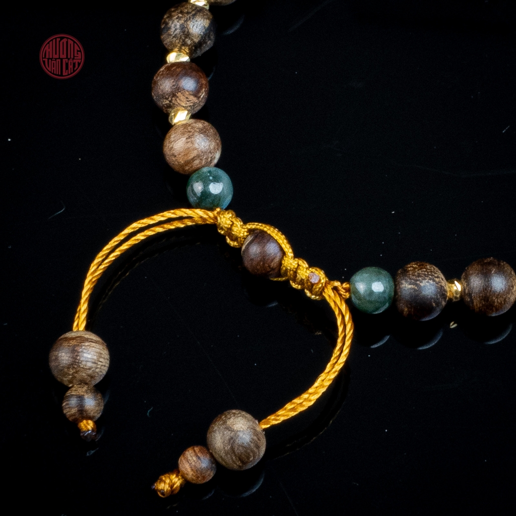 Vòng tay Trầm Hương nữ cận chìm 6 li mix charm ngọc ( kiểu 1 )