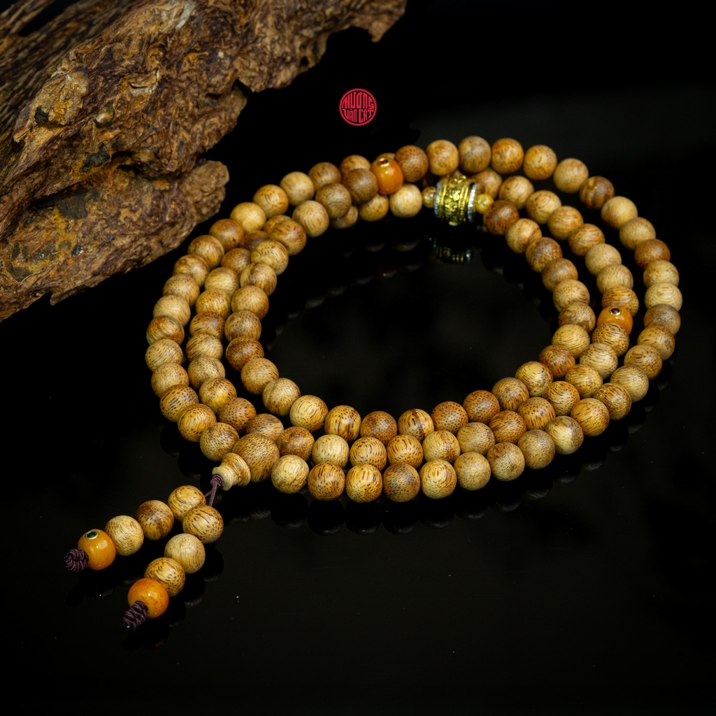 Chuỗi trầm hương 108 hạt 8 li banh mix charm bạc