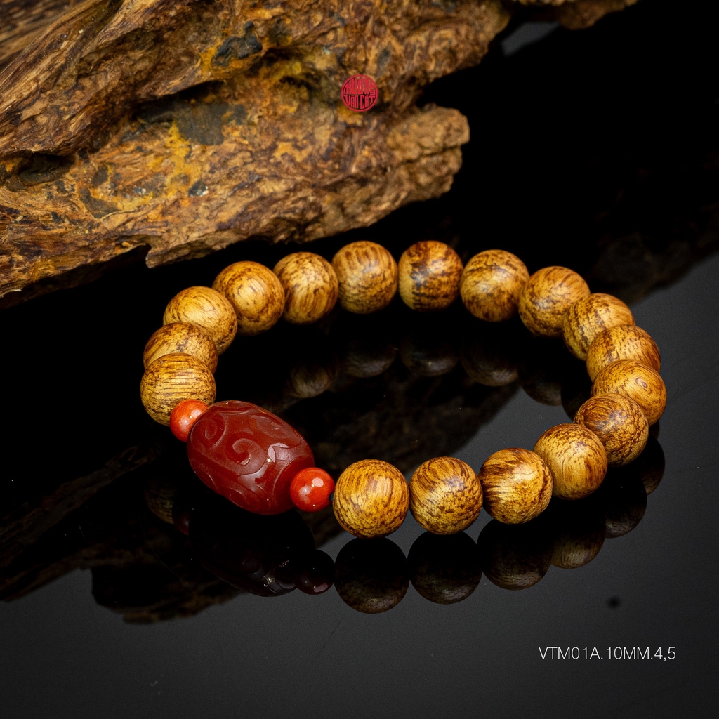 Vòng trầm hương banh quầng 10 li mix ngọc đỏ