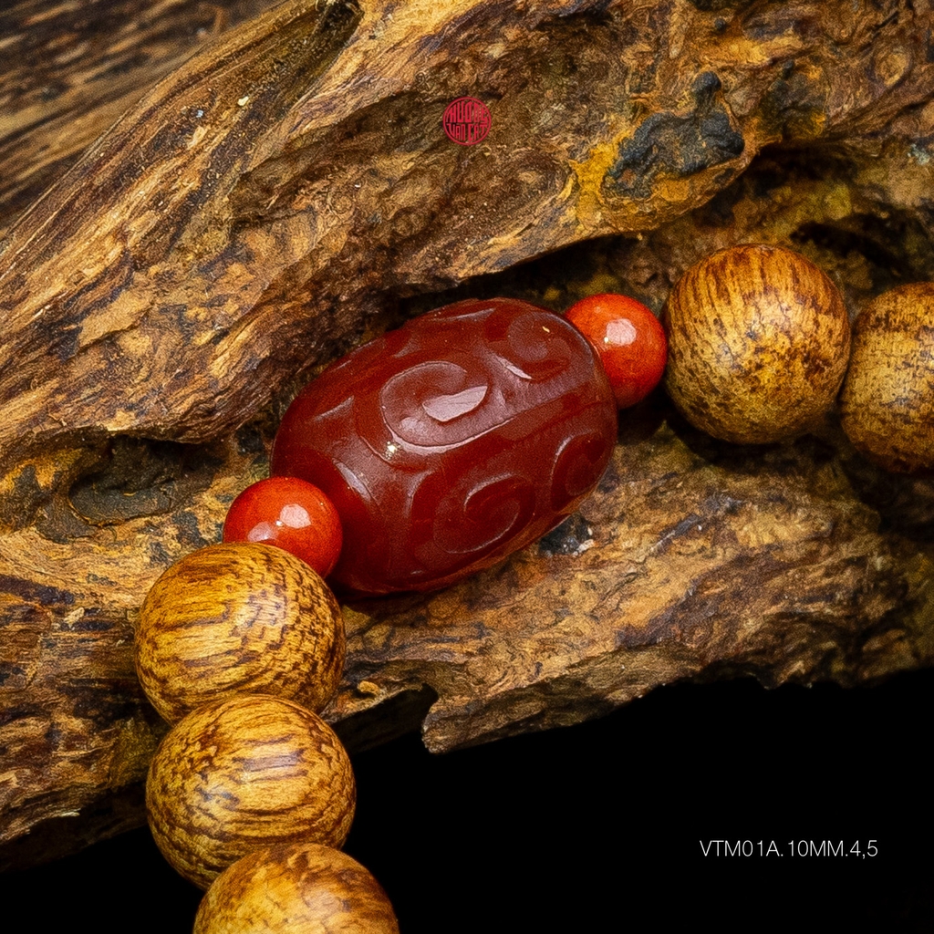 Vòng trầm hương banh quầng 10 li mix ngọc đỏ