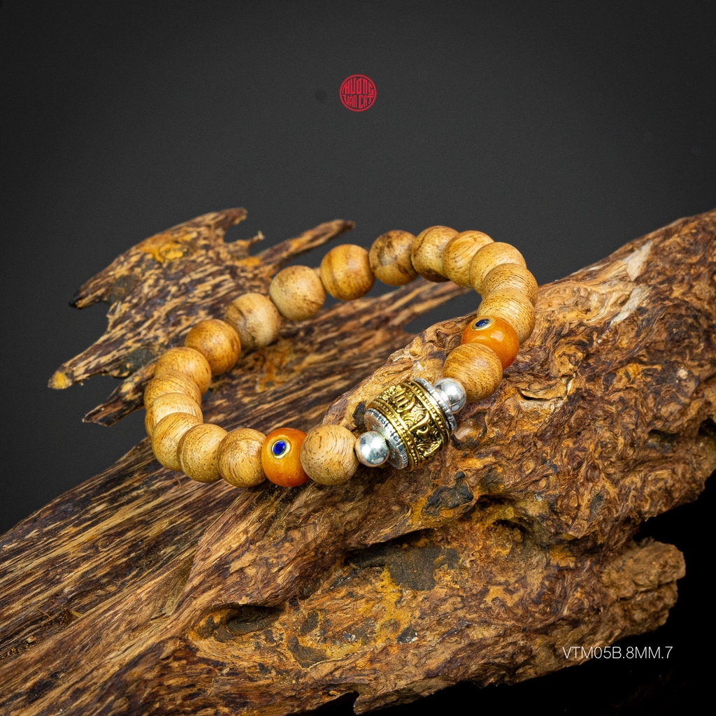 Vòng trầm hương tròn banh bông 8 li mix charm bạc