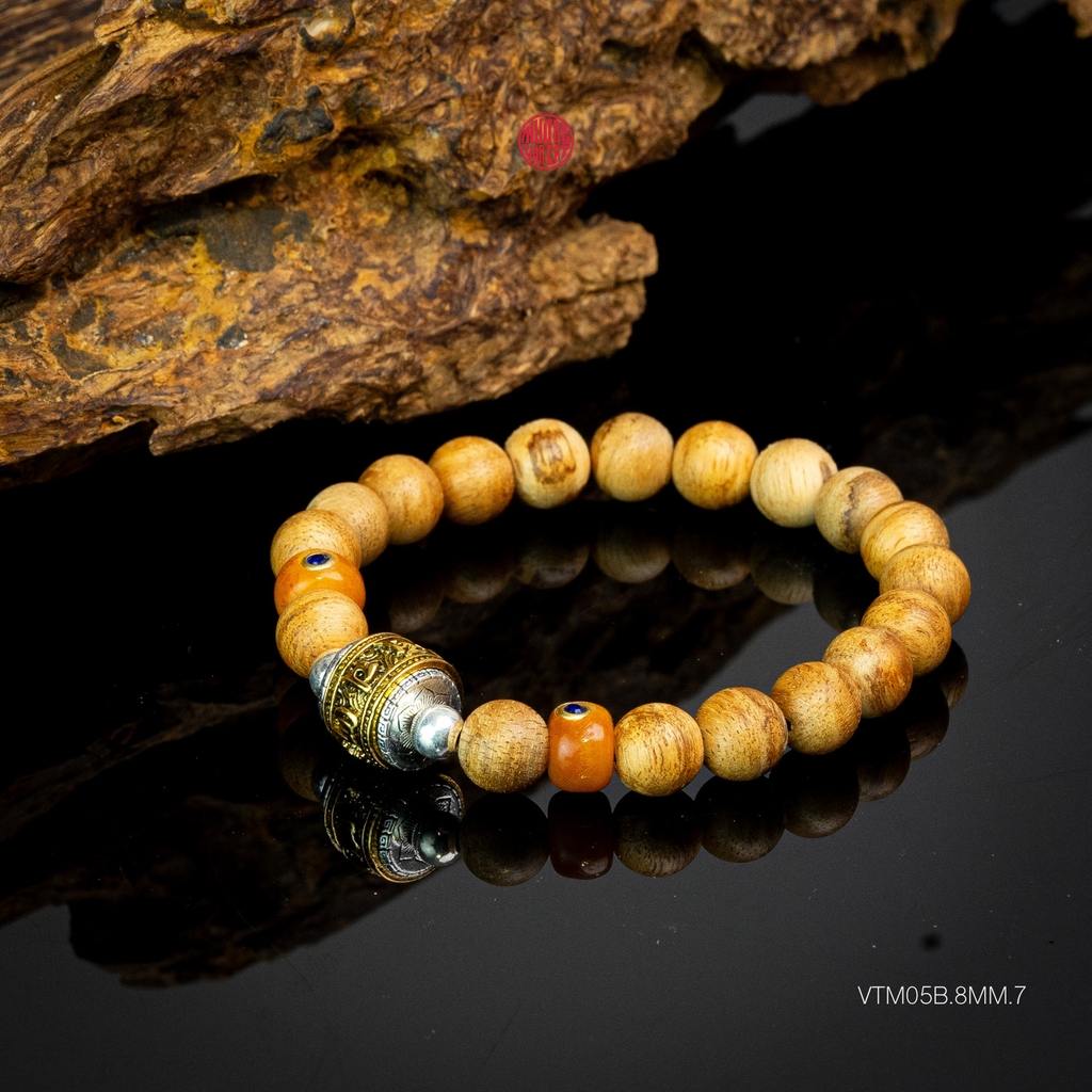 Vòng trầm hương tròn banh bông 8 li mix charm bạc