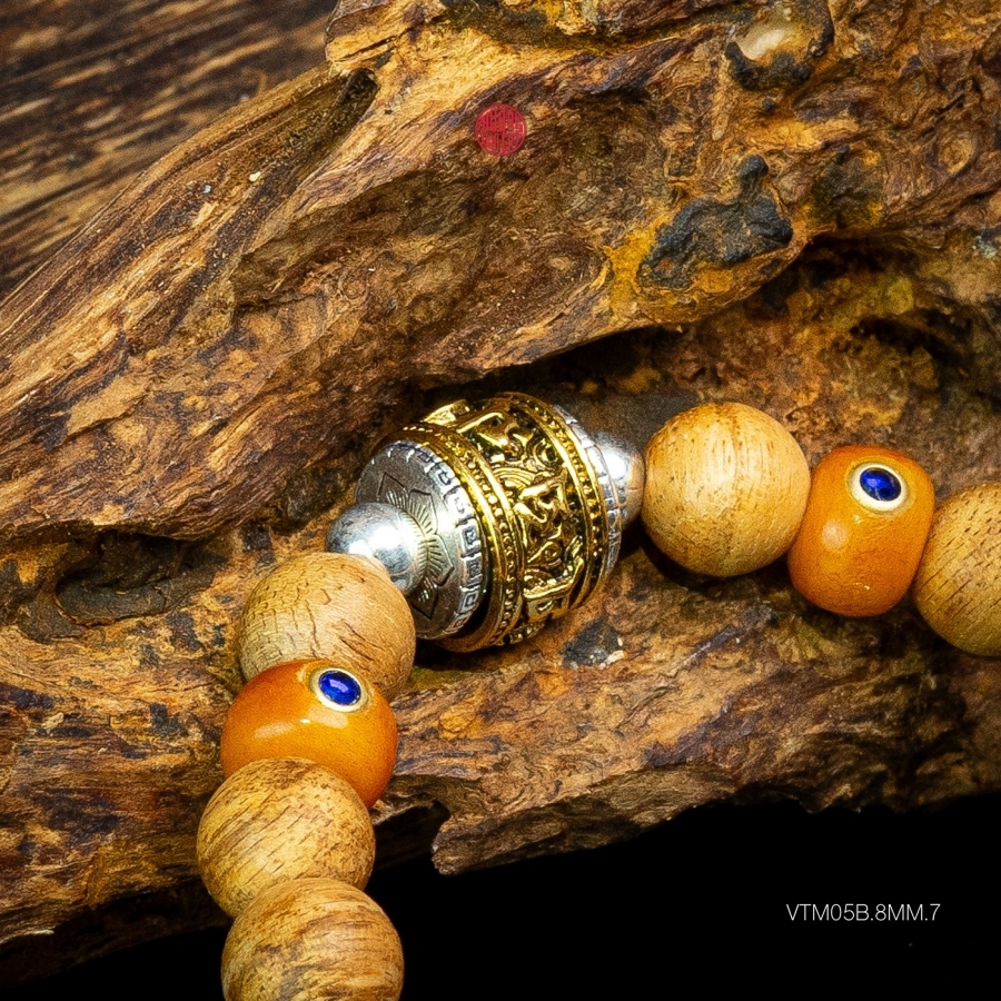 Vòng trầm hương tròn banh bông 8 li mix charm bạc