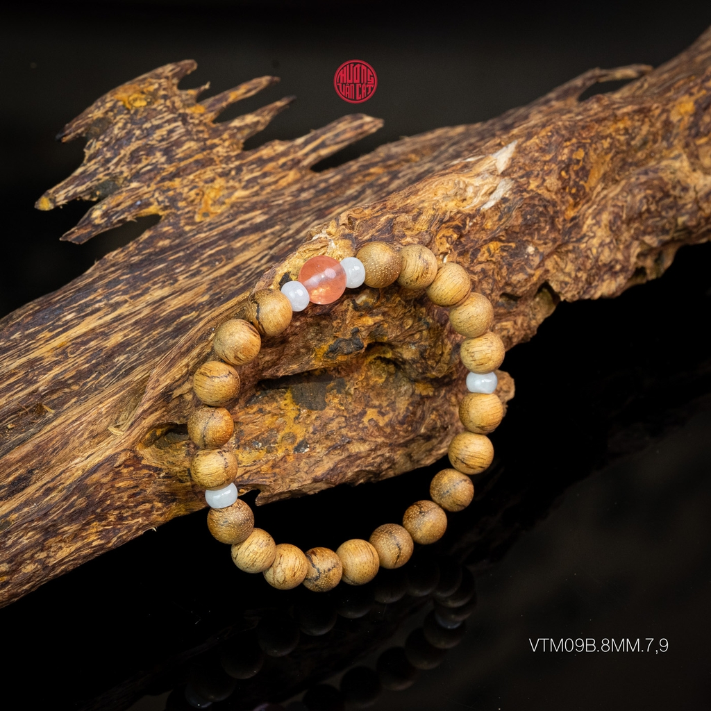 Vòng trầm hương tròn banh đỏ 8 li mix ngọc hồng