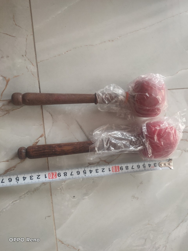 Chày gõ và chày xoay của Chuông xoay