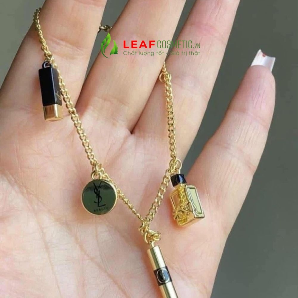 Lắc Tay YSL Beauté Dáng Xích Màu Vàng Phối Charm Mỹ Phẩm