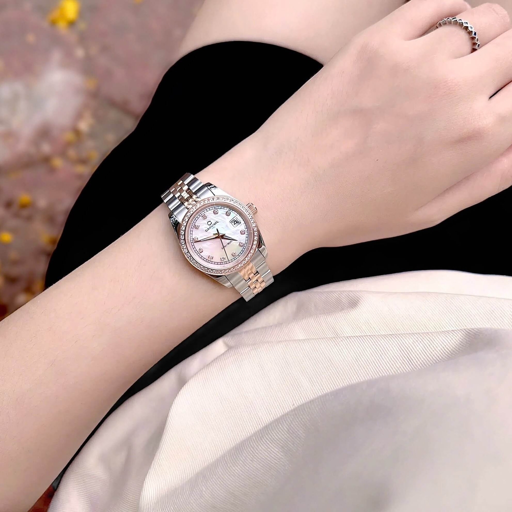 Đồng Hồ Nữ Carnival 8131L2-CH-TK Dây Demi Vàng Hồng Mặt Xà Cừ Trắng Viền Đính Đá Size 31mm Quartz Japan