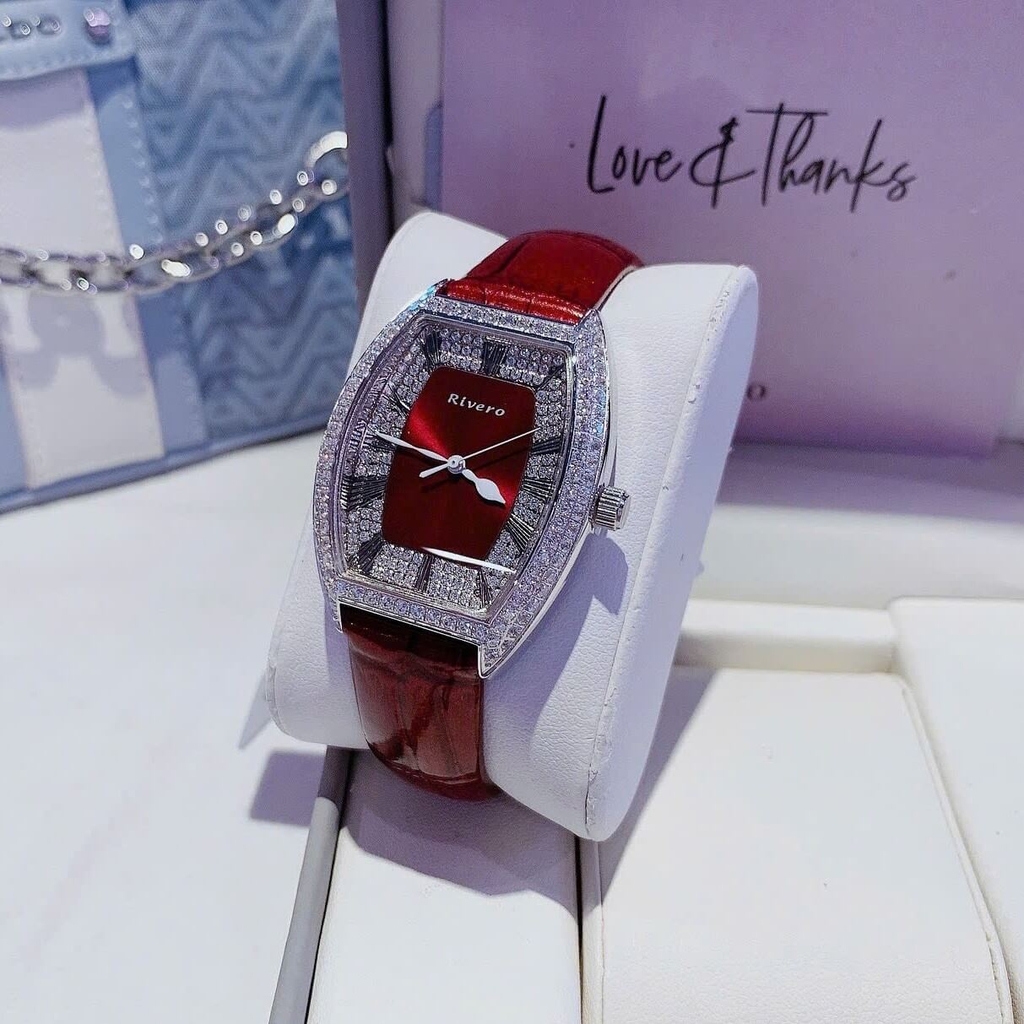 Đồng Hồ Nữ Rivero R9007 Dây Da Đỏ Đính Đá Mặt Oval Size 34mm Vỏ Thép Silver Quartz