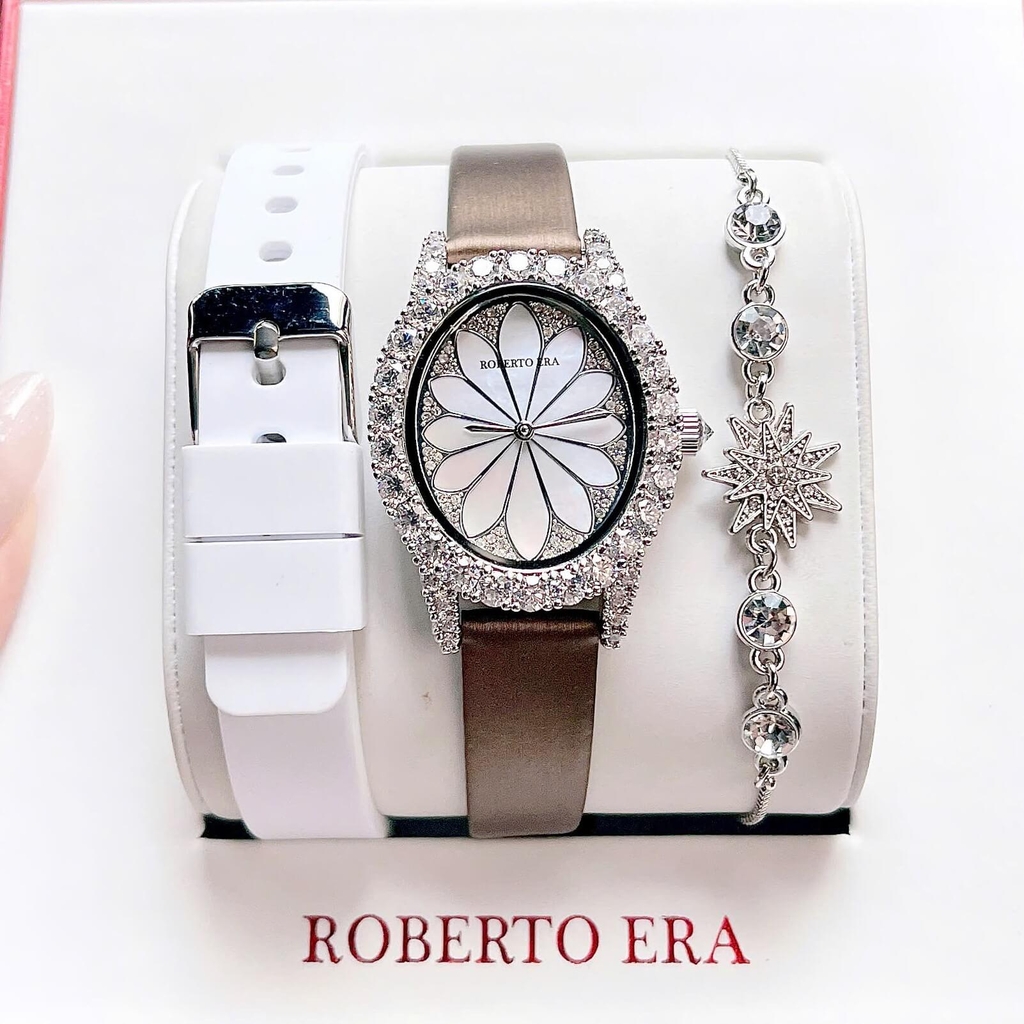 Set Đồng Hồ Nữ Roberto Era Dây Da Lụa Nâu Mặt Oval Họa Tiết 12 Cánh Hoa Size 33mm Viền Đá RE220 Tặng Kèm Bộ Dây Cao Su Trắng Và Vòng Tay